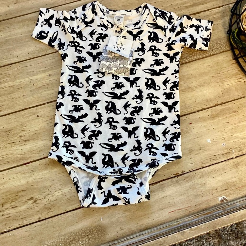 Kate Quinn dragons onesie